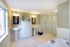 Luxury Bathroom With Iron Tub And Walk-in Shower And Double Sinks.